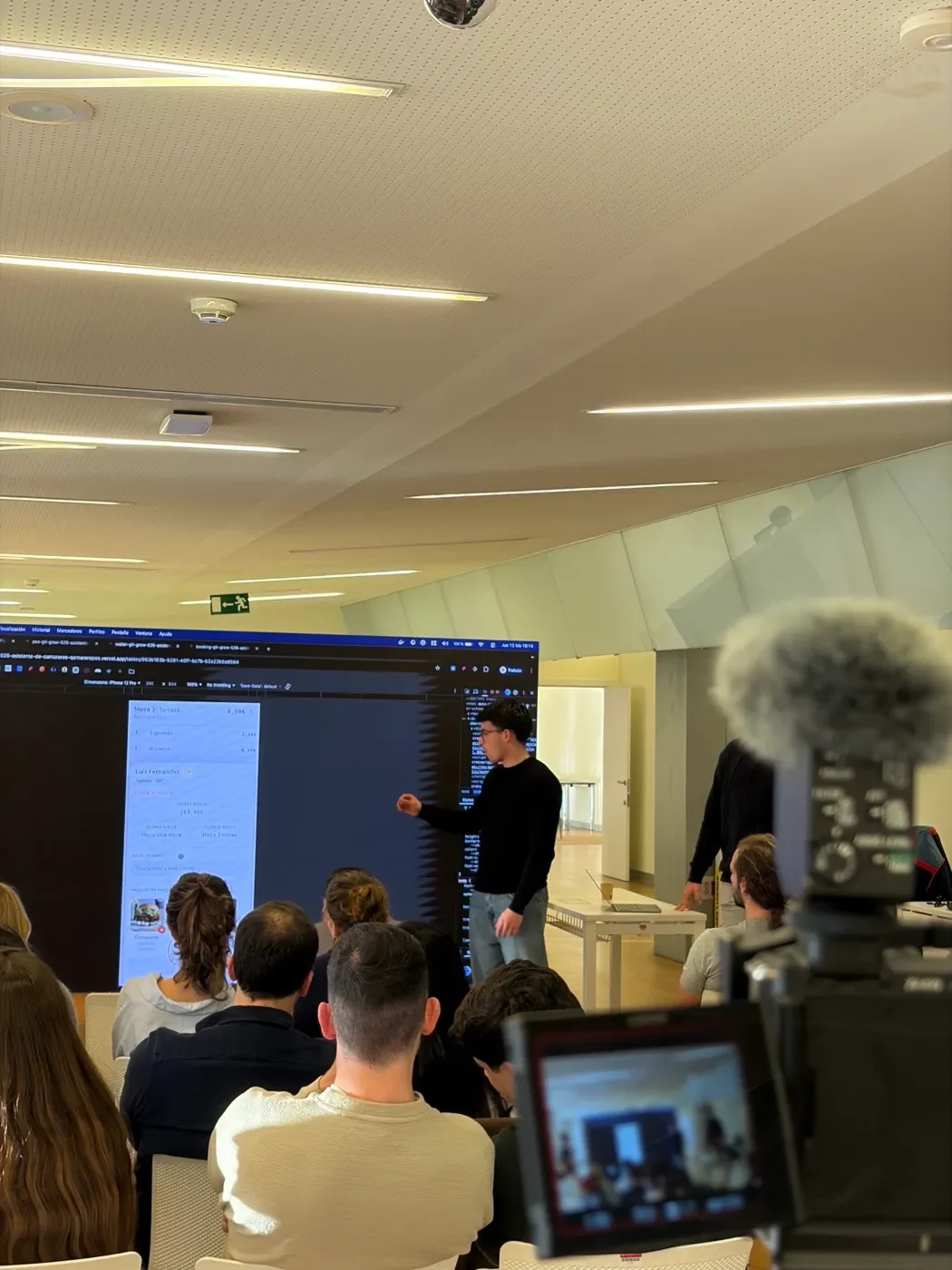 Victor Gonzalez presenting his product to an audience on camera
